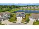 Aerial view of a home with a pond view, showcasing the neighborhood's attractive setting at 6762 Brentwood Ct, Brownsburg, IN 46112