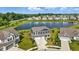 Aerial view of a waterside property, showing the community's well-planned layout and natural beauty at 6762 Brentwood Ct, Brownsburg, IN 46112