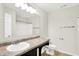 Bathroom showcasing a large mirror, spacious counter, and modern fixtures and finishes at 6762 Brentwood Ct, Brownsburg, IN 46112