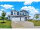 Stately two-story home with a three-car garage and manicured lawn at 6762 Brentwood Ct, Brownsburg, IN 46112