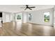 Living room with hardwood floors and a seamless transition to the scenic outdoors at 6762 Brentwood Ct, Brownsburg, IN 46112