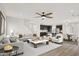 Open-concept living space with modern decor, hardwood floors, and an eat in kitchen area at 6762 Brentwood Ct, Brownsburg, IN 46112