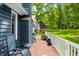 Back deck with room to relax and lounge, and views of a wooded area and other properties at 6933 Grey Wolf Dr, , IN 46164