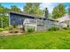 Lush backyard featuring a spacious deck, stone steps and a beautifully maintained lawn, perfect for outdoor enjoyment at 6933 Grey Wolf Dr, , IN 46164