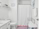 A modern bathroom with a toilet and vanity, plus organized storage solutions at 6933 Grey Wolf Dr, , IN 46164