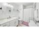 Clean and well-lit bathroom with white cabinets, marble countertops, and modern fixtures at 6933 Grey Wolf Dr, , IN 46164