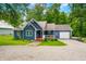 Inviting cottage home with a well-kept lawn, a front porch, and an attached garage at 6933 Grey Wolf Dr, , IN 46164