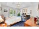 Serene main bedroom features tray ceiling, a ceiling fan, and outdoor access at 6933 Grey Wolf Dr, , IN 46164