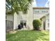 Backyard with a covered grill and patio chairs, surrounded by grass and a fenced perimeter at 7042 Gavin Dr, Indianapolis, IN 46217