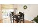 Bright dining area with sliding glass doors and stylish table and chairs, perfect for entertaining and relaxation at 7042 Gavin Dr, Indianapolis, IN 46217