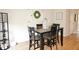 Bright dining area featuring a modern table set with seating for four, perfect for meals and gatherings at 7042 Gavin Dr, Indianapolis, IN 46217