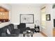 Cozy living room with ample seating, artwork, and adjacent kitchen view at 7042 Gavin Dr, Indianapolis, IN 46217