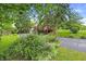 Front exterior view of house, yard, and driveway at 7061 Maryann Ct, Indianapolis, IN 46227