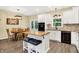 Well-designed kitchen with a butcher block island, stainless steel appliances, and lots of lighting at 7074 E Pine Needle Ln, Morgantown, IN 46160