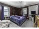 Comfortable bedroom with natural light and a cozy ambiance at 719 Melvenia St, Indianapolis, IN 46219