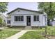 Charming single-story home with a well-maintained lawn and welcoming entrance at 719 Melvenia St, Indianapolis, IN 46219