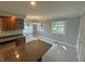 Bright kitchen with island features stainless appliances and a dining nook at 723 Bennett Rd, Carmel, IN 46032