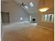 Spacious living room features skylights, a fireplace, carpet and abundant light at 723 Bennett Rd, Carmel, IN 46032