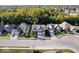Stunning aerial view of a residential neighborhood with tree-lined streets and well-maintained homes at 7249 Red Maple Dr, Zionsville, IN 46077