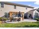 Backyard with a patio featuring a furnished pergola, grill, and landscaped surroundings at 7249 Red Maple Dr, Zionsville, IN 46077