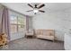 Bright bedroom with a crib and patterned wallpaper makes this room feel extra special at 7249 Red Maple Dr, Zionsville, IN 46077