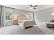 Serene main bedroom features a calming color palette, soft lighting, and ample natural light at 7249 Red Maple Dr, Zionsville, IN 46077