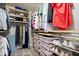 Spacious walk-in closet provides ample shelving and storage space for organization at 7249 Red Maple Dr, Zionsville, IN 46077