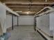 Unfinished basement with utilities, concrete floor, and open layout for flexible usage at 730 N Forsythe St, Franklin, IN 46131