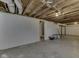 Unfinished basement with concrete floor, wood ceiling beams, and ample room for customization at 730 N Forsythe St, Franklin, IN 46131