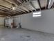 Unfinished basement featuring exposed wood beams, concrete floor, and potential for storage at 730 N Forsythe St, Franklin, IN 46131