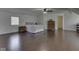 Large bedroom includes wood-look floors, ceiling fan, and lots of space to move around at 730 N Forsythe St, Franklin, IN 46131