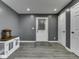 Welcoming entryway featuring grey walls, a charming area rug, and recessed lighting at 730 N Forsythe St, Franklin, IN 46131