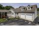 Charming home featuring a two-car garage, dormer windows and neutral-toned siding at 730 N Forsythe St, Franklin, IN 46131