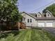 Charming home with well-kept lawn, wooden porch, and convenient ramp access at 730 N Forsythe St, Franklin, IN 46131
