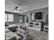 Cozy living room with modern furniture and view of the kitchen and entry door at 730 N Forsythe St, Franklin, IN 46131