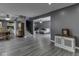 Open-concept living area features hardwood flooring and access to kitchen and living room at 730 N Forsythe St, Franklin, IN 46131