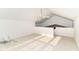 Bonus room with high ceilings and a ceiling fan at 7657 Winding Creek Dr, Indianapolis, IN 46236