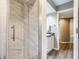 Luxurious bathroom with a glass-enclosed shower and a view into the spacious vanity area at 7803 Harbour, Indianapolis, IN 46240