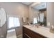 Modern bathroom with a sink, toilet, and open shower with tile surround at 831 Weghorst St, Indianapolis, IN 46203