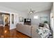Comfortable living room with hardwood floors, and a view of the bathroom at 831 Weghorst St, Indianapolis, IN 46203