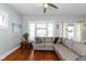 Comfortable living room featuring hardwood floors, and a comfortable sectional sofa at 831 Weghorst St, Indianapolis, IN 46203