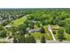 Picturesque aerial view of a charming home nestled among lush greenery and neighboring houses at 8510 N Carroll Rd, Indianapolis, IN 46236