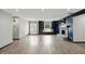 Spacious living room with a fireplace, built-in shelving, and ample natural light at 8510 N Carroll Rd, Indianapolis, IN 46236