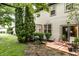 Backyard patio with seating and lush landscaping creating a serene outdoor space at 9263 Wadsworth Ct, Fishers, IN 46037