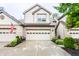 Charming two-story home with brick and siding, landscaped front yard, and attached two-car garage at 9263 Wadsworth Ct, Fishers, IN 46037