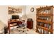 Functional home office with a desk, chair, bookshelves, and ample storage space at 9263 Wadsworth Ct, Fishers, IN 46037