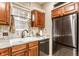 Charming kitchen with updated cabinets, granite countertops, stainless steel appliances, and modern fixtures at 9263 Wadsworth Ct, Fishers, IN 46037