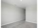 Neutral bedroom featuring carpet flooring, base trim, and light gray walls at 9537 Crossfield Rd, Avon, IN 46123