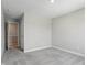 Neutral bedroom featuring carpet flooring, base trim, and light gray walls at 9537 Crossfield Rd, Avon, IN 46123