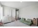 Bedroom featuring carpet floors, gray walls, a window view and a couch at 9537 Crossfield Rd, Avon, IN 46123